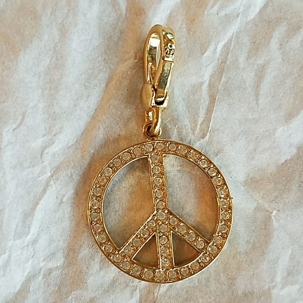 New Juicy Couture Peace Charm 36$
